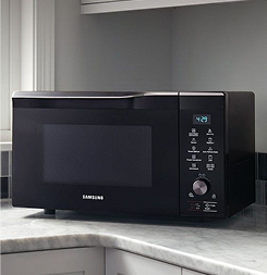 Built-in microwave oven in kitchen cabinetry