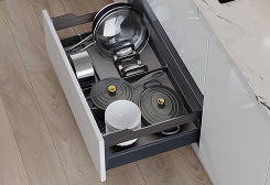 Angled corner drawer for efficient storage access