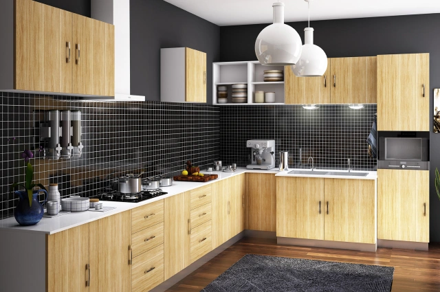 Compact L-shaped kitchen featuring wood accents