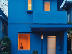 Exterior house painting with a fresh coat of vibrant color, protecting the surface from weather elements