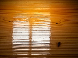 Various types of wood finishes showcasing natural textures