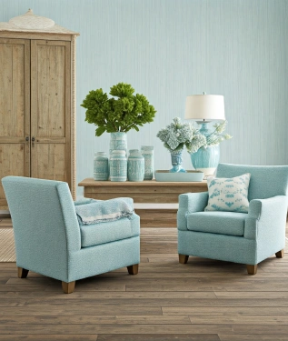 Coastal wall with shiplap paneling and beachy colors.